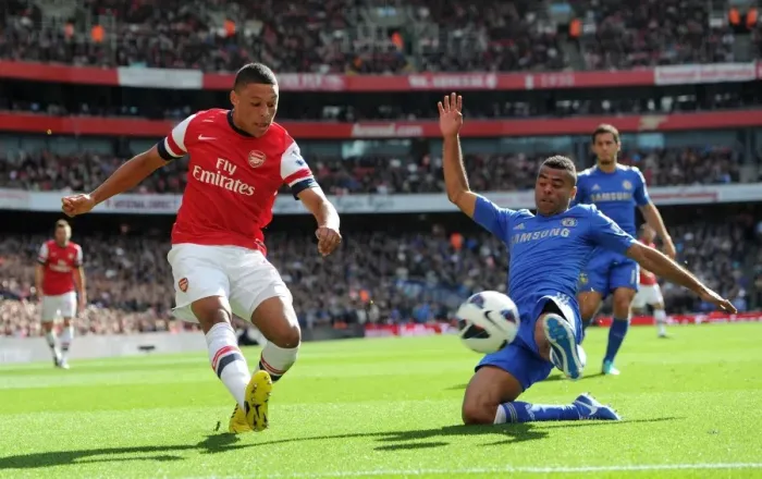 Framed Print : Clash at the Emirates: Oxlade-Chamberlain vs. Cole Framed Print : Clash at the Emirates: Oxlade-Chamberlain vs. Cole