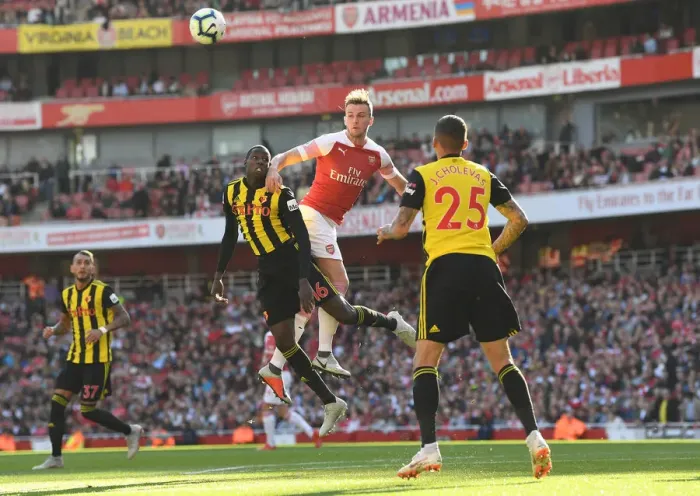 Framed Print : Clash at the Emirates: Rob Holding vs Abdoulaye Doucoure