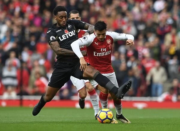 Clash at the Emirates: Sanchez vs. Fer in Arsenal's Battle Against Swansea City