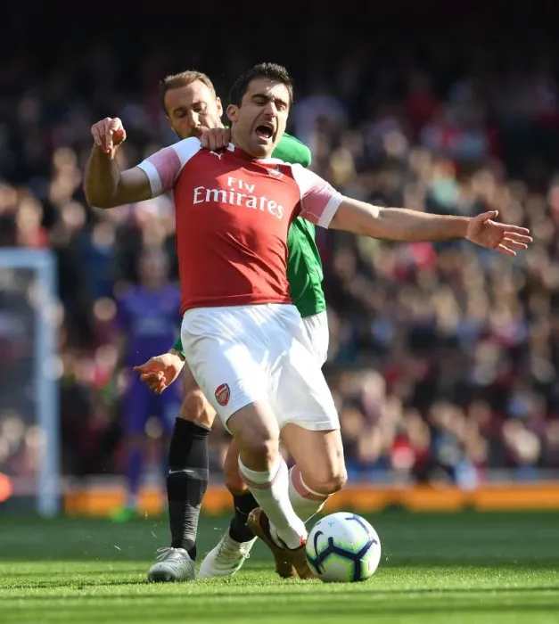 Framed Print : Clash at Emirates: Sokratis vs. Murray in Arsenal's Battle against Brighton