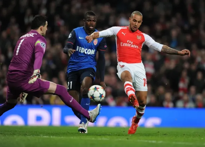 Framed Print : Clash at the Emirates: Walcott vs Monaco's Defense in UCL Showdown