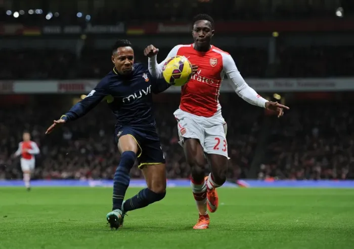 Framed Print : Clash at Emirates: Welbeck vs. Clyne in Arsenal's Battle against Southampton (2014-15)
