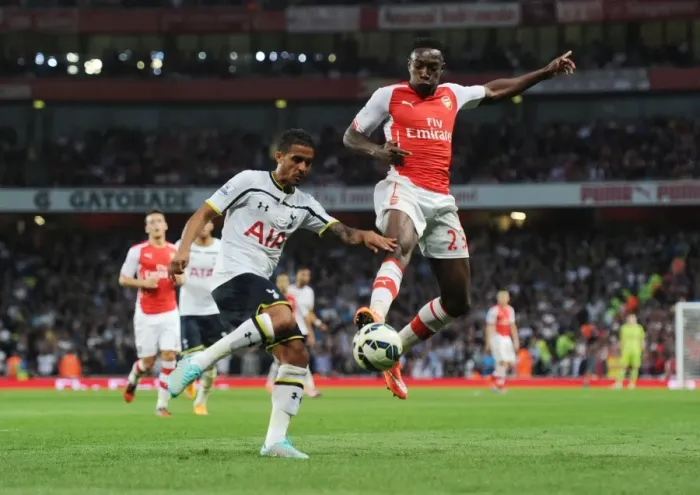 Framed Print : Clash at the Emirates: Welbeck vs. Naughton in the Arsenal-Tottenham Rivalry