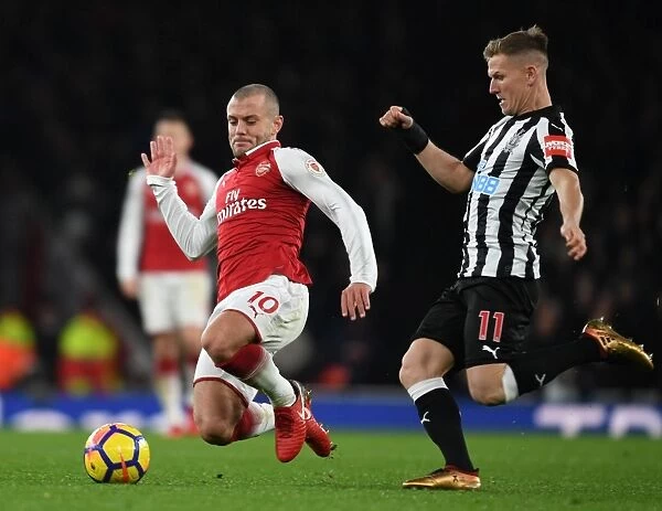 Clash at the Emirates: Wilshere vs Ritchie in Arsenal's Battle Against Newcastle (2017-18)