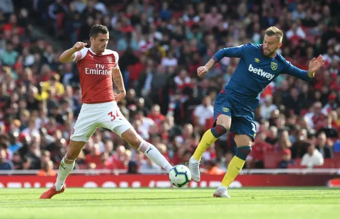 Framed Print : Clash at the Emirates: Xhaka vs. Yarmolenko in Premier League Showdown