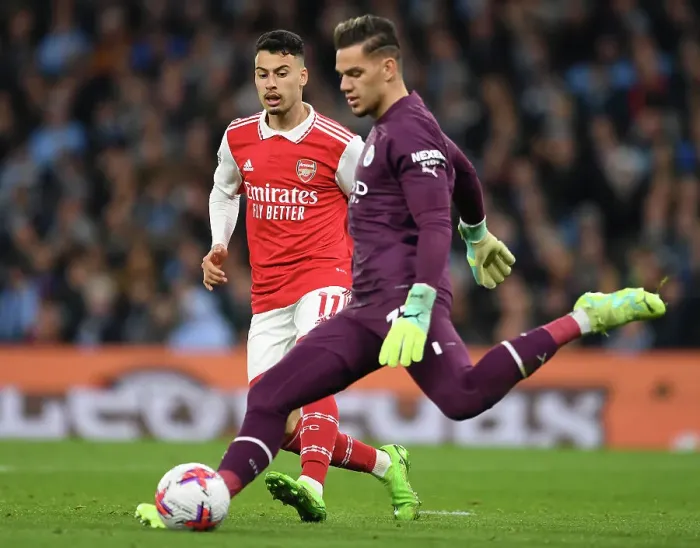 Framed Print : Clash at the Etihad: Martinelli Chases Down Ederson in Manchester City vs. Arsenal Premier League Showdown