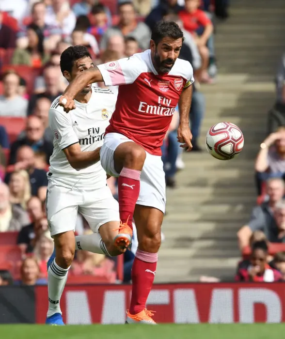 Framed Print : A Clash of Football Greats: Robert Pires Reunites with Arsenal and Real Madrid Legends in London