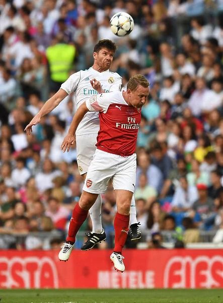 Clash of Football Legends: Arsenal vs. Real Madrid at Bernabeu (2018-19) - Ray Parlour vs. Xabi Alonso