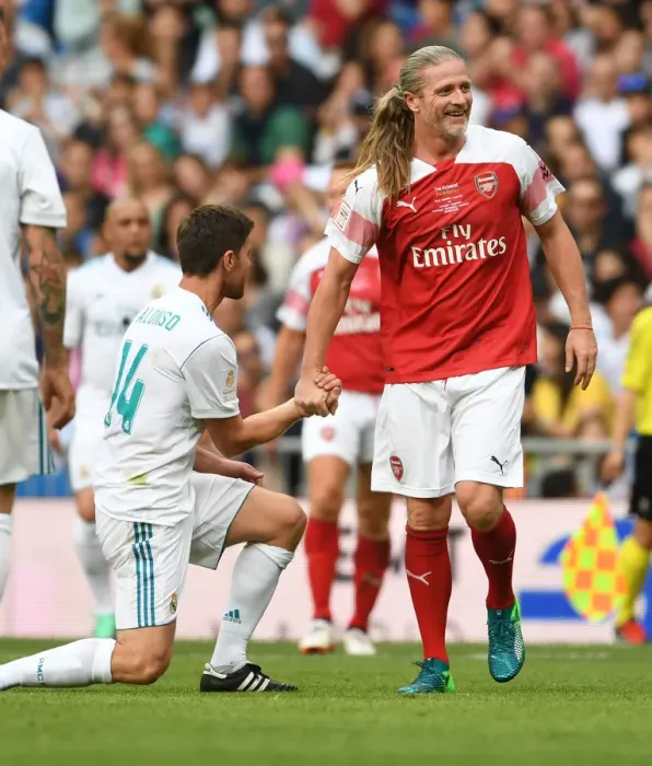 Framed Print : Clash of Football Legends: Emmanuel Petit vs. Xabi Alonso - Arsenal vs. Real Madrid (2018-19)