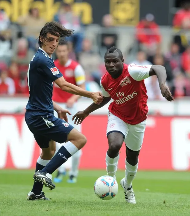 Framed Print : Clash of Forces: Frimpong vs. Geromel in Cologne's Pre-Season Battle with Arsenal Framed Print : Clash of Forces: Frimpong vs. Geromel in Cologne's Pre-Season Battle with Arsenal