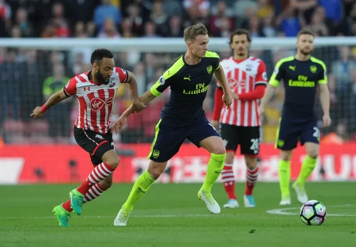 Framed Print : Clash of Forces: Holding vs. Redmond in Southampton vs. Arsenal Premier League Showdown Framed Print : Clash of Forces: Holding vs. Redmond in Southampton vs. Arsenal Premier League Showdown