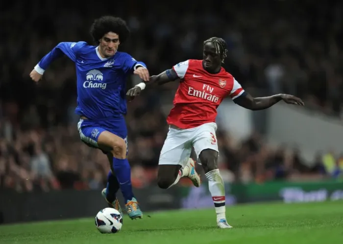 Framed Print : Clash of Forces: Sagna vs. Fellaini - Arsenal v Everton, Premier League