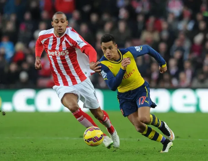 Framed Print : Clash of Forces: Sanchez vs Nzonzi in Stoke City vs Arsenal (2014-15) Framed Print : Clash of Forces: Sanchez vs Nzonzi in Stoke City vs Arsenal (2014-15)