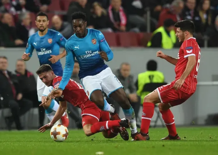 Framed Print : Clash of Forces: Welbeck vs. Ozcan, Jojic - FC Koln vs. Arsenal UEFA Europa League