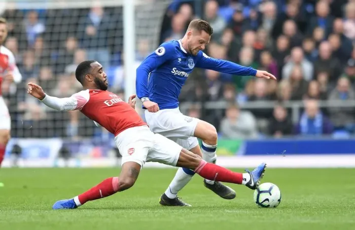 Framed Print : Clash at Goodison Park: Lacazette vs. Sigurdsson in Premier League Showdown Framed Print : Clash at Goodison Park: Lacazette vs. Sigurdsson in Premier League Showdown