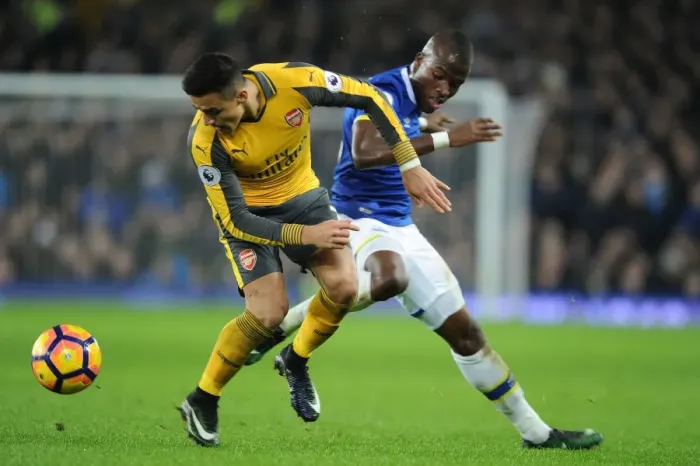 Framed Print : Clash at Goodison Park: Sanchez vs. Gueye in Everton vs. Arsenal Premier League Showdown Framed Print : Clash at Goodison Park: Sanchez vs. Gueye in Everton vs. Arsenal Premier League Showdown
