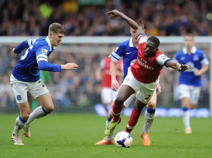 Framed Print : Clash at Goodison Park: Sanogo vs McCarthy & Stones (Everton vs Arsenal, Premier League) Framed Print : Clash at Goodison Park: Sanogo vs McCarthy & Stones (Everton vs Arsenal, Premier League)