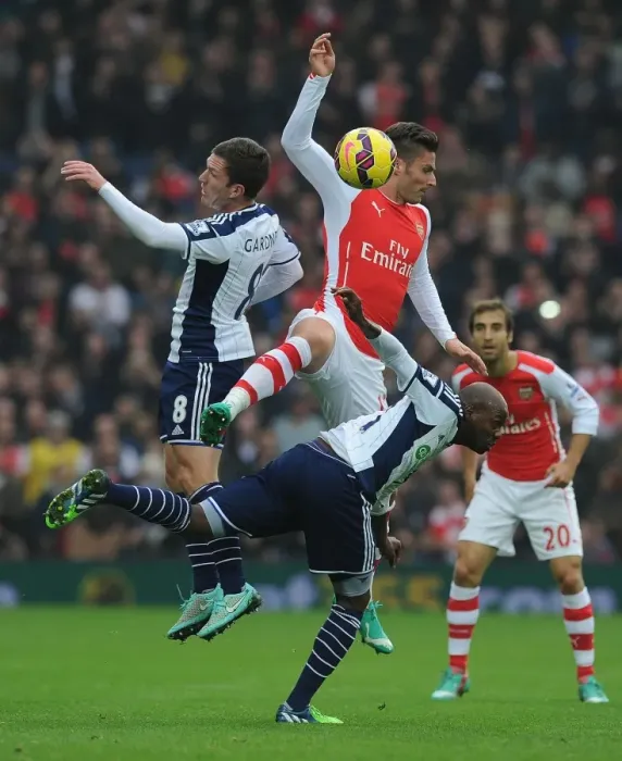 Framed Print : Clash at The Hawthorns: Giroud Faces Off Against Gardner and Mulumbu (West Bromwich Albion vs Arsenal, 2014 / 15) Framed Print : Clash at The Hawthorns: Giroud Faces Off Against Gardner and Mulumbu (West Bromwich Albion vs Arsenal, 2014 / 15)