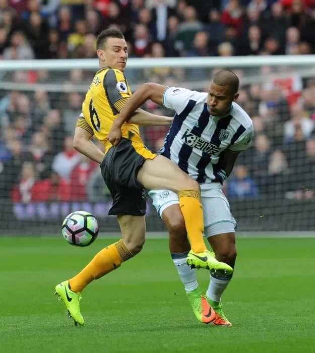 Framed Print : Clash at The Hawthorns: Koscielny vs Rondon in Premier League Battle Framed Print : Clash at The Hawthorns: Koscielny vs Rondon in Premier League Battle