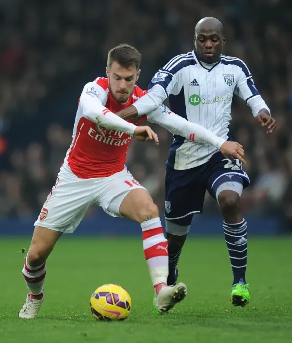 Framed Print : Clash at The Hawthorns: Ramsey vs. Mulumbu