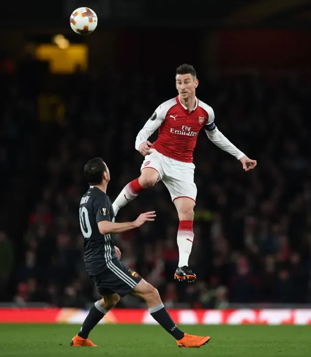 Framed Print : Clash of Heads: Koscielny vs. Dzagoev in Arsenal's Europa League Battle Framed Print : Clash of Heads: Koscielny vs. Dzagoev in Arsenal's Europa League Battle