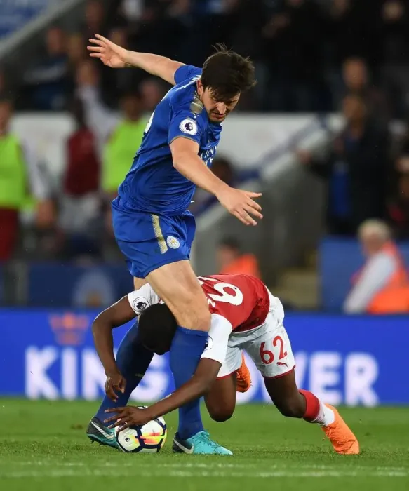 Framed Print : Clash at The King Power: Nketiah vs Maguire in Premier League Showdown Framed Print : Clash at The King Power: Nketiah vs Maguire in Premier League Showdown