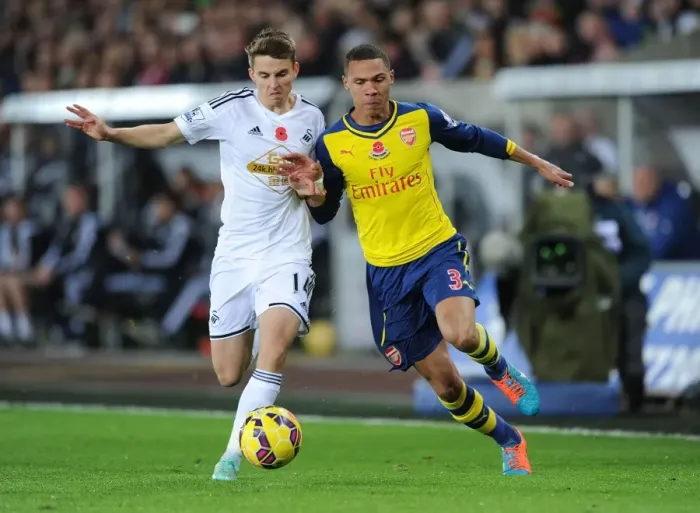 Framed Print : Clash at Liberty: Gibbs vs. Carroll - Swansea vs. Arsenal, 2014-15 Premier League Framed Print : Clash at Liberty: Gibbs vs. Carroll - Swansea vs. Arsenal, 2014-15 Premier League