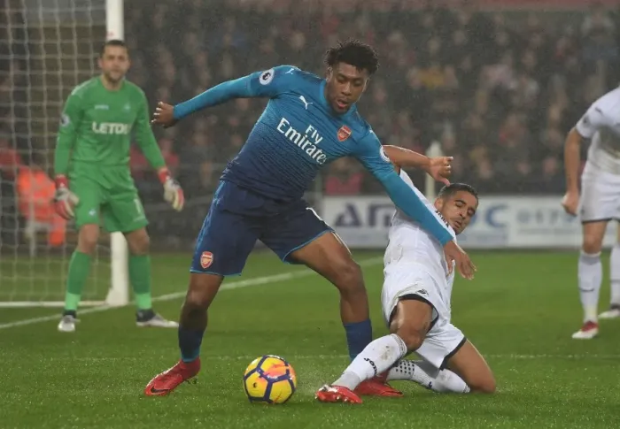 Framed Print : Clash at Liberty: Iwobi vs. Naughton - A Premier League Showdown