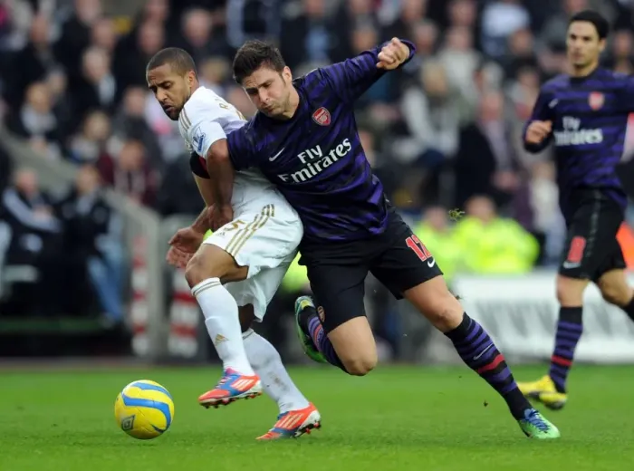 Framed Print : Clash at the Liberty: Swansea vs. Arsenal - FA Cup Third Round: Giroud vs. Routledge