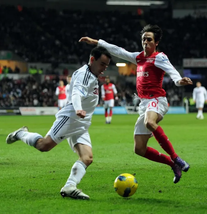 Framed Print : Clash at Liberty: Yossi Benayoun vs. Leon Britton - Swansea City vs. Arsenal, Premier League, 2012 Framed Print : Clash at Liberty: Yossi Benayoun vs. Leon Britton - Swansea City vs. Arsenal, Premier League, 2012
