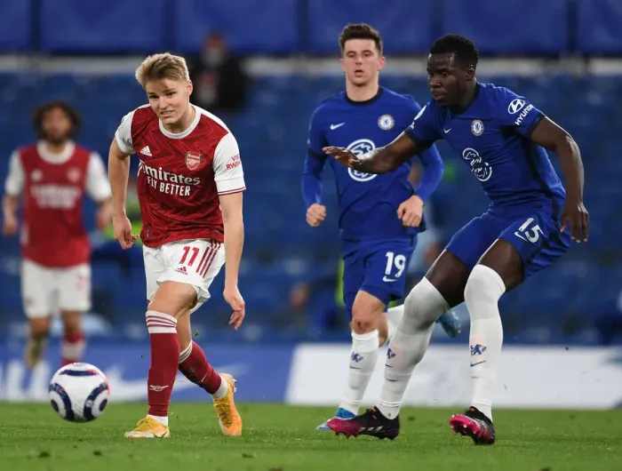 Framed Print : Clash of London Rivals: Martin Odegaard vs. Kurt Zouma at Empty Stamford Bridge - Chelsea vs. Arsenal, Premier League 2020-21 Framed Print : Clash of London Rivals: Martin Odegaard vs. Kurt Zouma at Empty Stamford Bridge - Chelsea vs. Arsenal, Premier League 2020-21