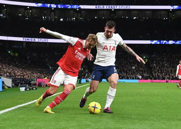 Framed Print : Clash of London Rivals: Odegaard vs. Hojbjerg in the Premier League Showdown - Tottenham vs. Arsenal