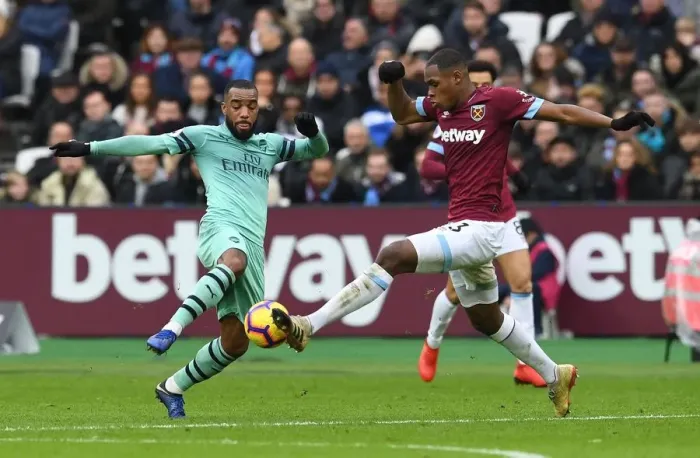 Framed Print : Clash at the London Stadium: Lacazette vs. Diop - Arsenal vs. West Ham United, Premier League Framed Print : Clash at the London Stadium: Lacazette vs. Diop - Arsenal vs. West Ham United, Premier League