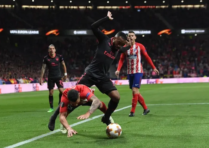 Framed Print : Clash in Madrid: Lacazette vs. Vitolo in the Europa League Semi-Final Showdown