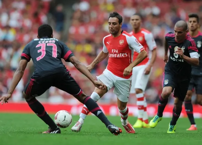 Framed Print : Clash of Midfield Maestros: Cazorla vs Cesar at the Emirates Cup