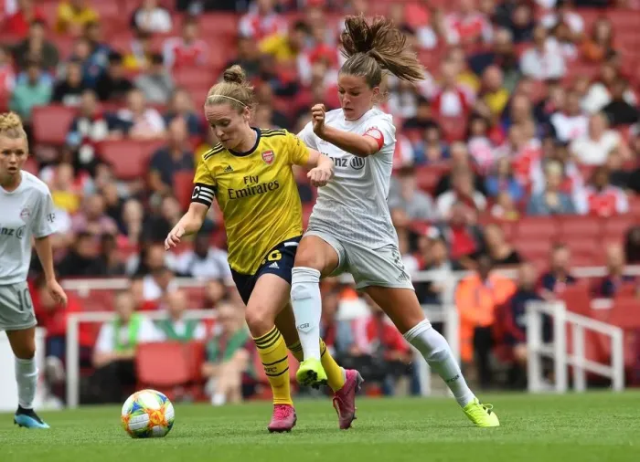 Framed Print : Clash of Midfield Maestros: Kim Little vs. Melanie Leupolz at the Emirates Cup