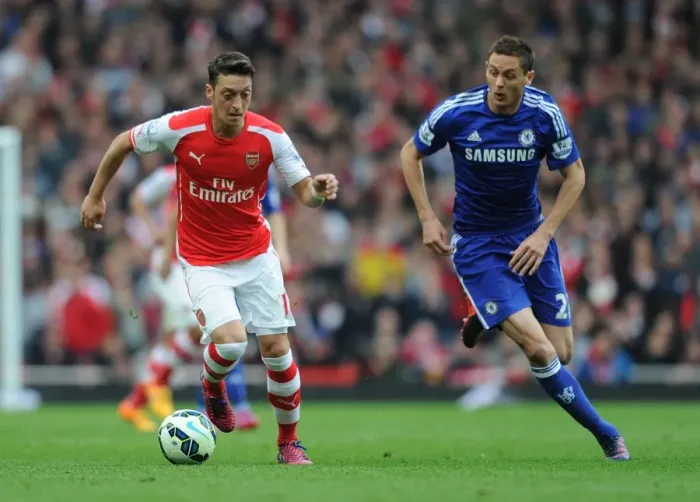 Framed Print : Clash of Midfield Maestros: Ozil vs. Matic - Arsenal vs. Chelsea, Premier League Showdown Framed Print : Clash of Midfield Maestros: Ozil vs. Matic - Arsenal vs. Chelsea, Premier League Showdown
