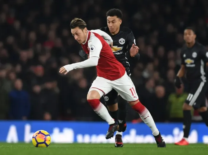 Framed Print : Clash of Midfield Maestros: Ozil vs Lingard - Arsenal vs Manchester United, Premier League 2017-18