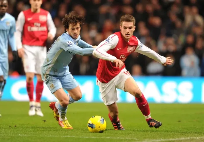 Framed Print : Clash of the Midfield Maestros: Ramsey vs Silva, Manchester City vs Arsenal, Premier League 2011-12 Framed Print : Clash of the Midfield Maestros: Ramsey vs Silva, Manchester City vs Arsenal, Premier League 2011-12