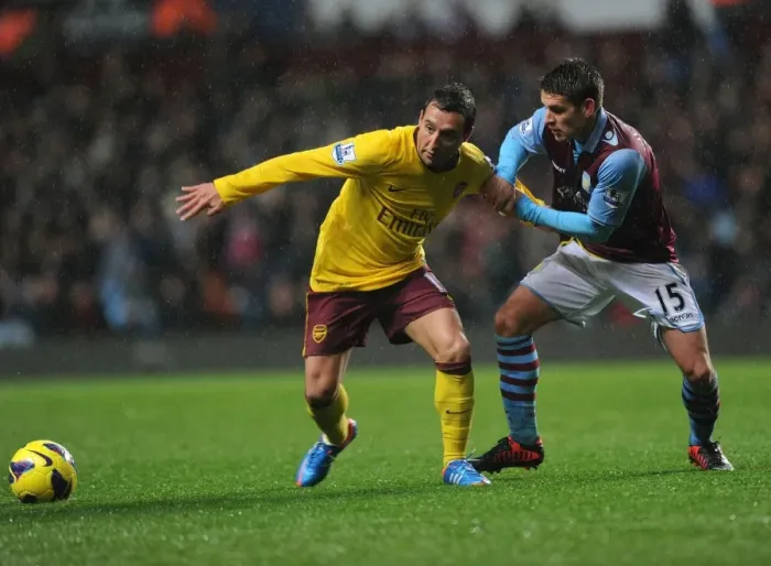 Framed Print : Clash of Midfield Maestros: Santi Cazorla vs. Ashley Westwood (Aston Villa vs. Arsenal, 2012-13) Framed Print : Clash of Midfield Maestros: Santi Cazorla vs. Ashley Westwood (Aston Villa vs. Arsenal, 2012-13)