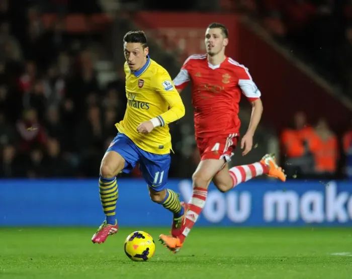 Framed Print : Clash of Midfield Masters: Ozil vs. Schneiderlin, Arsenal vs. Southampton, 2013-14