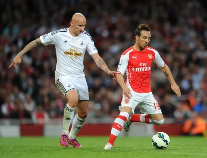 Framed Print : Clash of Midfield Talents: Cazorla vs. Shelvey, Arsenal vs. Swansea City, Premier League 2014 / 15
