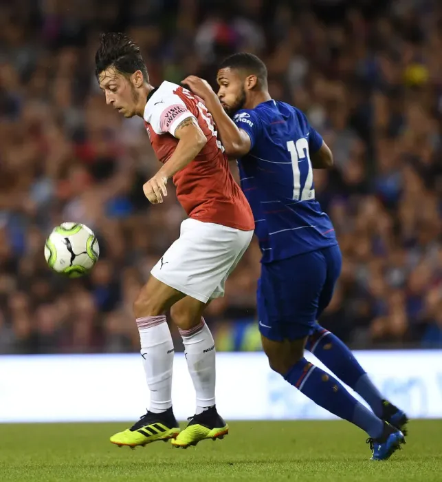 Framed Print : Clash of Midfield Talents: Ozil vs. Loftus-Cheek in Arsenal vs. Chelsea Pre-Season Battle Framed Print : Clash of Midfield Talents: Ozil vs. Loftus-Cheek in Arsenal vs. Chelsea Pre-Season Battle