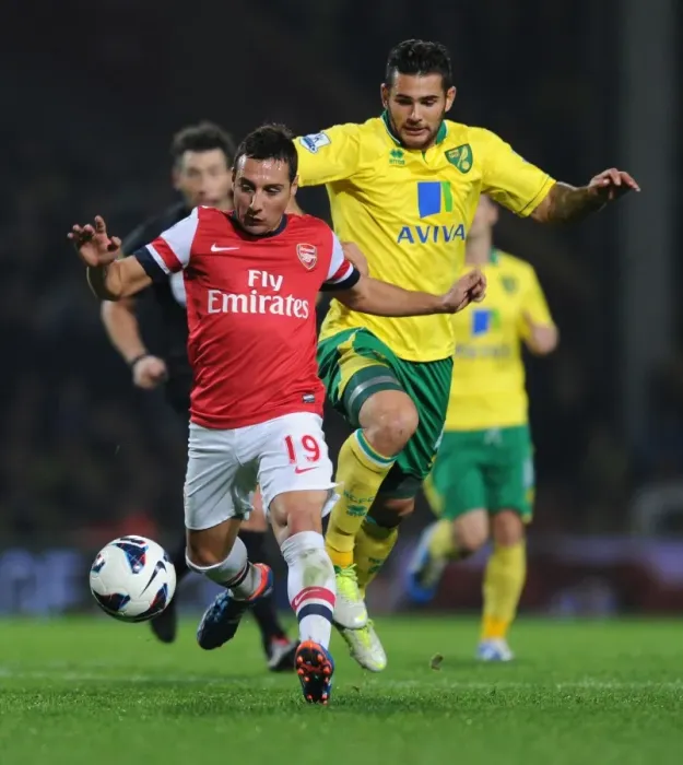 Framed Print : Clash of Midfield Talents: Santi Cazorla vs. Bradley Johnson (Norwich City vs. Arsenal, 2012-13)