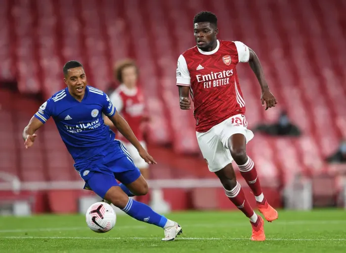 Framed Print : Clash of Midfield Titans: Thomas Partey vs Youri Tielemans in Empty Arsenal vs Leicester City Premier League Match, 2020-21 Framed Print : Clash of Midfield Titans: Thomas Partey vs Youri Tielemans in Empty Arsenal vs Leicester City Premier League Match, 2020-21