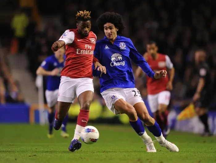 Framed Print : Clash of Midfield Titans: Alex Song vs. Marouane Fellaini (Everton v Arsenal, 2012) Framed Print : Clash of Midfield Titans: Alex Song vs. Marouane Fellaini (Everton v Arsenal, 2012)
