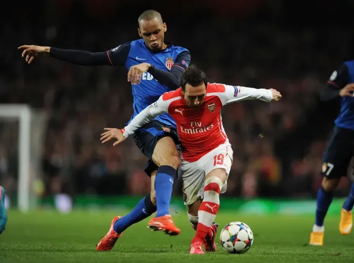 Framed Print : Clash of Midfield Titans: Cazorla vs Fabinho - Arsenal's Battle in the UEFA Champions League Framed Print : Clash of Midfield Titans: Cazorla vs Fabinho - Arsenal's Battle in the UEFA Champions League