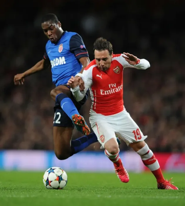 Framed Print : Clash of Midfield Titans: Cazorla vs Kondogbia in Arsenal's UEFA Champions League Battle against Monaco