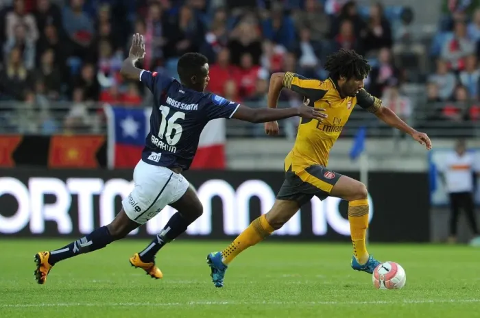 Framed Print : Clash of Midfield Titans: Elneny vs. Ibrhim in Arsenal's Pre-Season Battle against Viking FK
