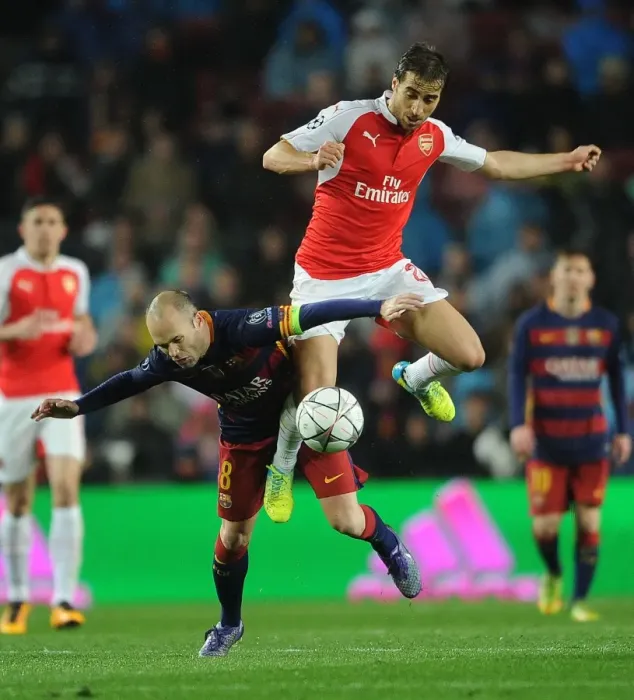 Framed Print : Clash of Midfield Titans: Flamini vs. Iniesta - Arsenal vs. Barcelona, UEFA Champions League 2016